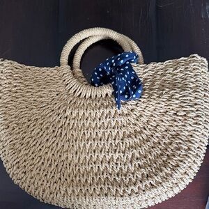 Stylish Tan Woven Handbag with Polka Dot Accent